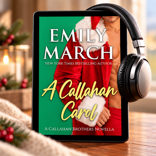 The audiobook A Callahan Carol displayed on a tablet with headphones propped on one corner against a Christmas background.